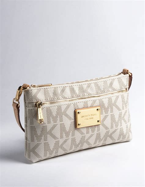 michael michael kors large logo wristlet bag|Michael Kors logo strap crossbody.